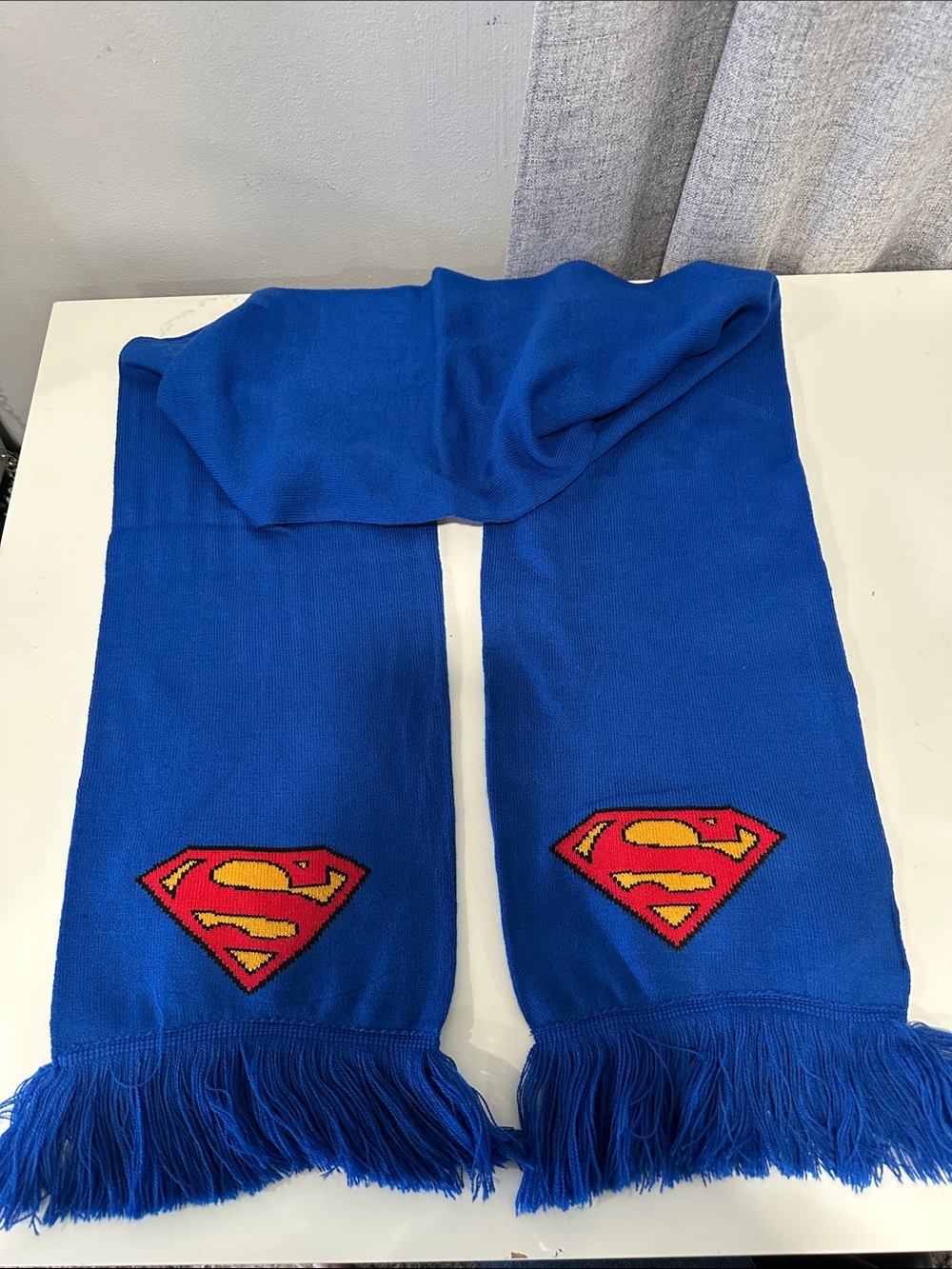 Warner Bros. Blue Superman Knit Scarf with Red & Yellow Shield. NWT.